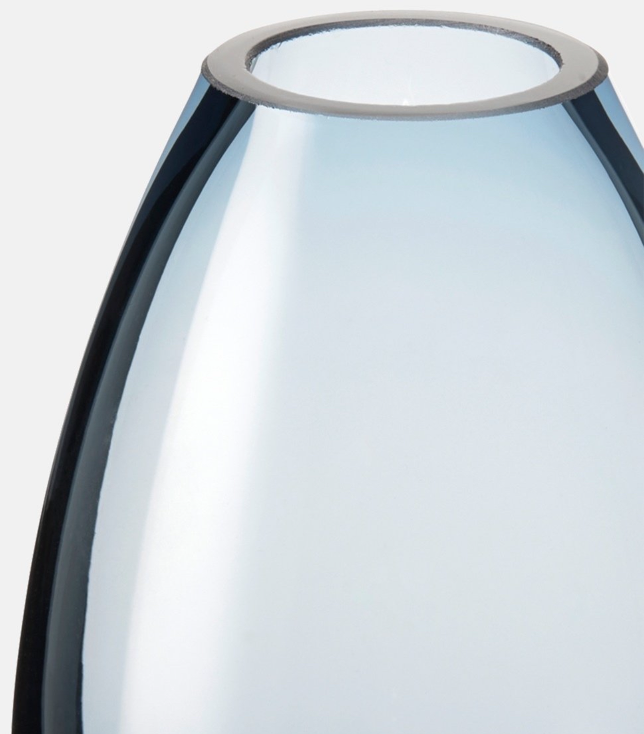 Close-up of the rim and top opening of the Holmegaard blue glass vase.