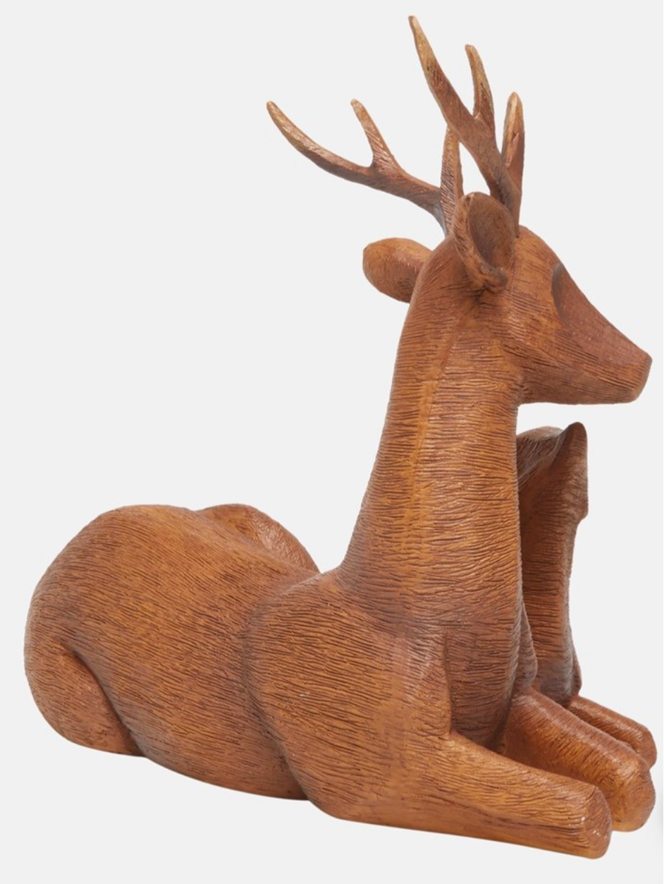 Side angle of the Lawrence Grey deer figure showing resting pose and antlers.
